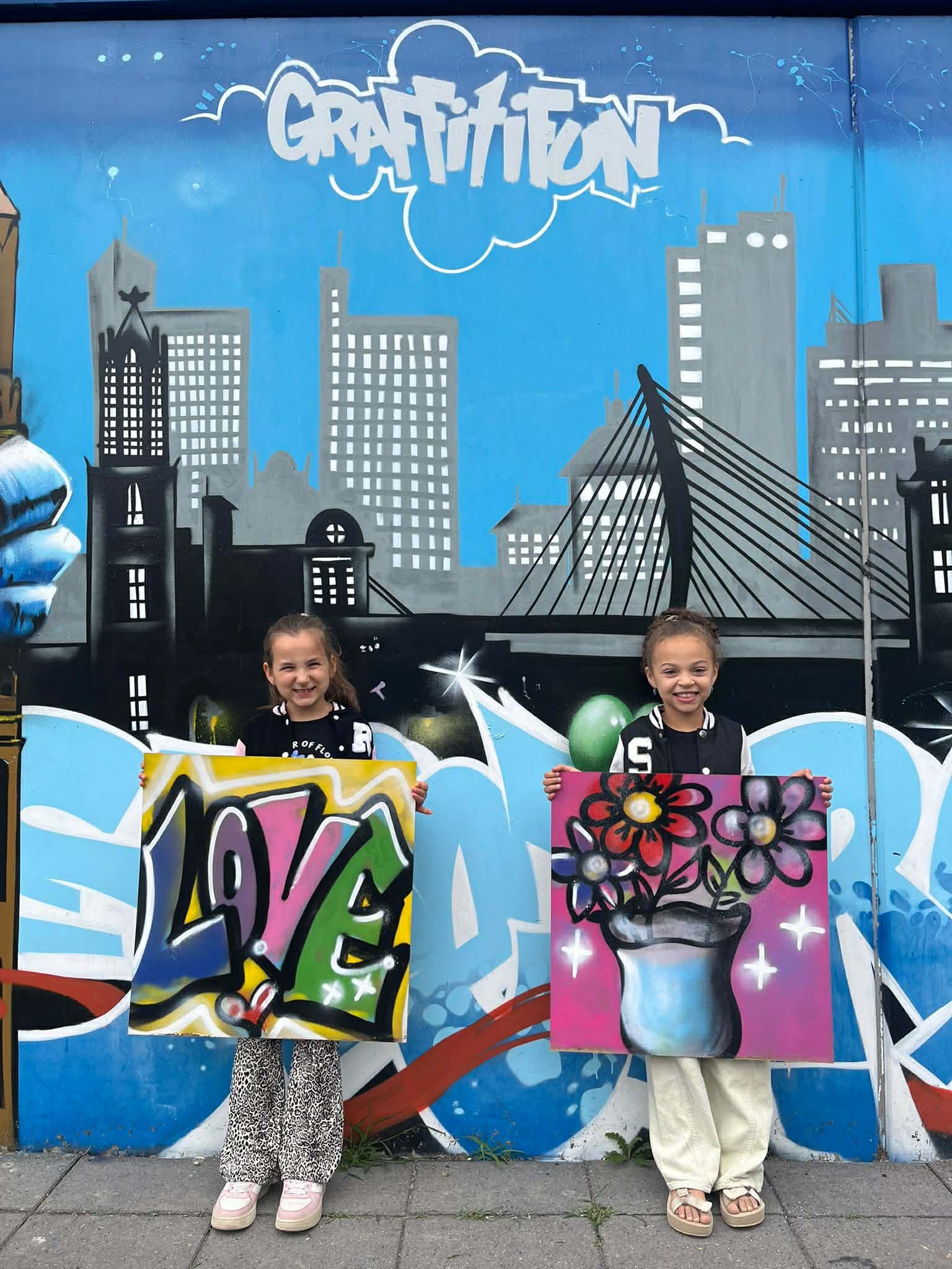 Two kids enjoying a graffiti workshop, kids parties in Sofia